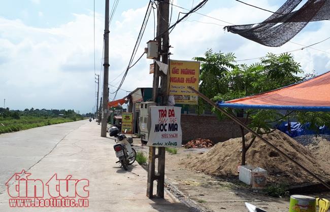 Bao giờ cột điện gây cản trở giao thông ở huyện Hoài Đức mới được di dời? ảnh 4